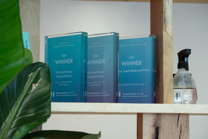 Award trophies on a shelf in the Picnic office