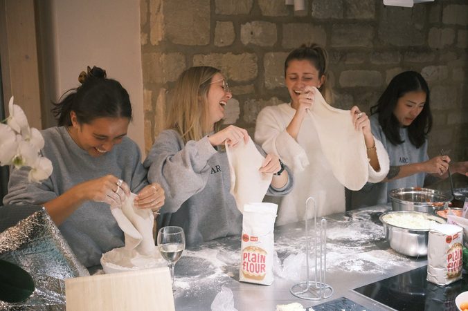 The Picnic team sharing pizza