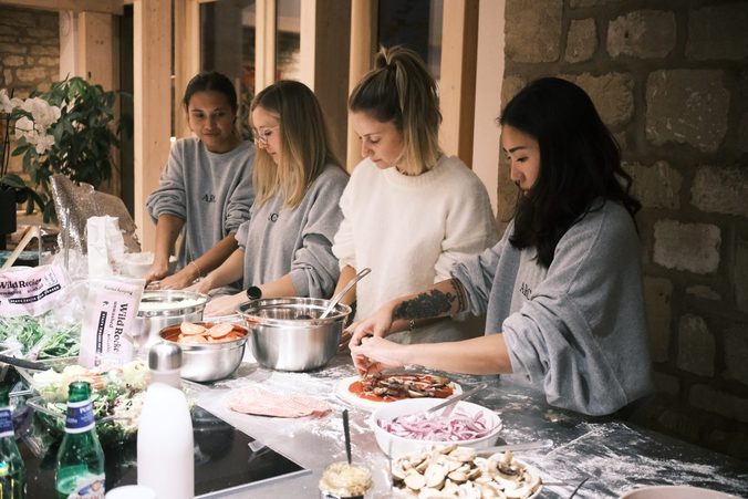 The Picnic team sharing pizza